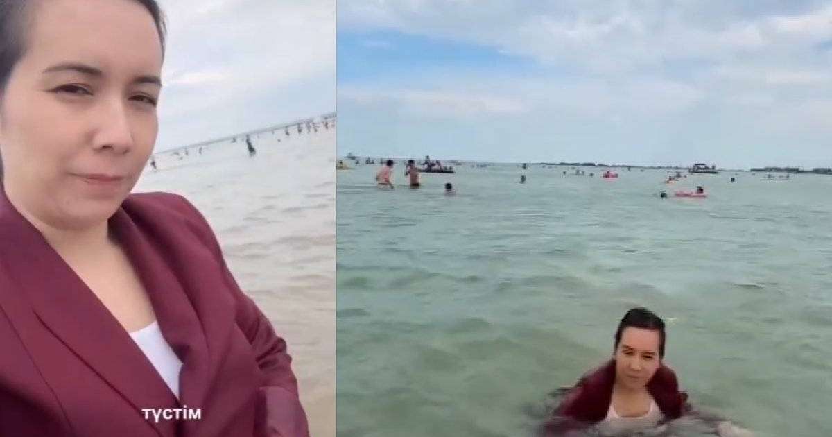 Мұғалім киіммен суға түсті