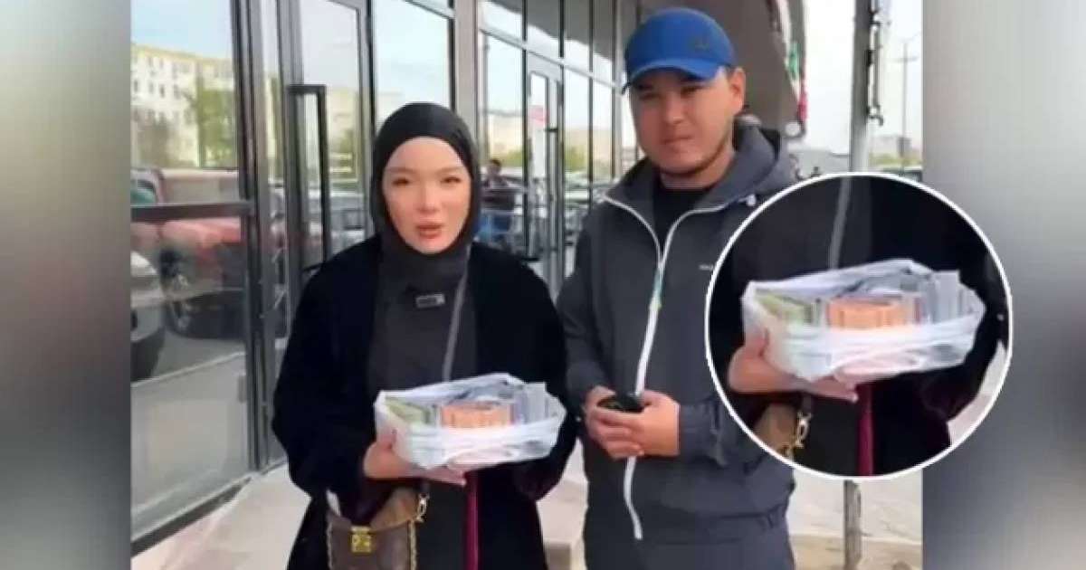 Абай Бегейдің қызы заңсыз лотерея ойнататын парақшасын жанталаса бұғаттап, жазбаларын өшіріп жатыр