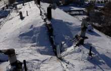 Петропавлда қар бес қабатты үйдің шатырын опырып жіберді