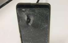 Телефон ер адамды атылған оқтан қорғап қалған