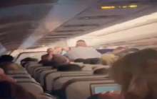 Әйелдің ұшақта босанған сәті видеоға түсіп қалды