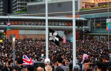 Гонконгте ондаған мың адам тағы да наразылыққа шықты