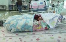 Әйел перзентхана терезесінен екі сәбиді лақтырып жіберді