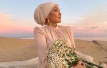 Индира Расылхан: Орамал таққаным үшін жобалардан қысқартылғаным рас