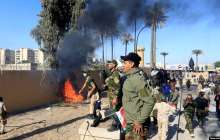 Иракта АҚШ елшілігіне басып кірмек болғандарды газ шашып таратты