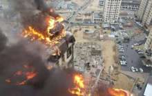 Ақтауда өртеніп жатқан тұрғын үй кешенінен 50 адам эвакуацияланды (ВИДЕО)