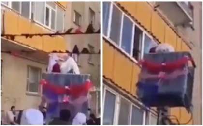 Жас келінді жоғары қабаттағы үйге кранмен кіргізгендер елді шулатты (ВИДЕО)