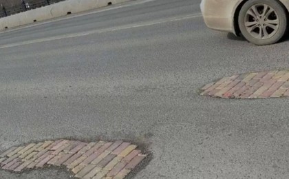 Қабырға ма, жол ма?: Жолдың жамауы көпті күлкіге қарық қылды