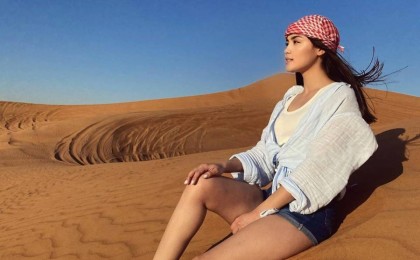 "Хиджаб қайда?". Жұрт қысқа киген Ақбота Сейітмағанбетті ұрысып тастады (фото, видео)