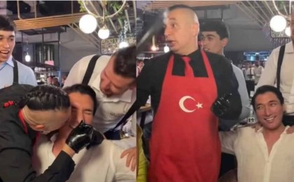 Әлішер Кәрімовті бір топ жігіт сүйіп, денесін уқалаған видеосы тарады