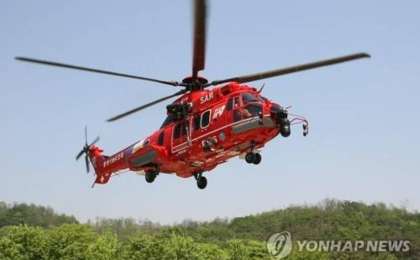 韩一架消防直升机坠海 7人下落不明