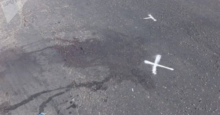 көшеде оқ атып, адамды көлігімен басып өткен жүргізуші іздестірілуде