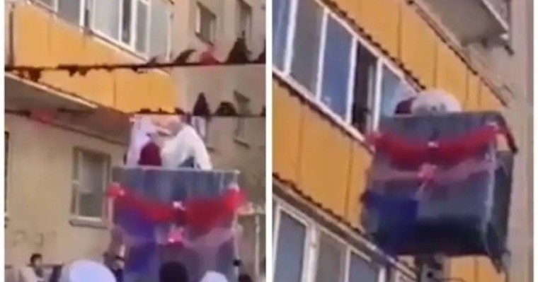 Жас келінді жоғары қабаттағы үйге кранмен кіргізгендер елді шулатты (ВИДЕО)