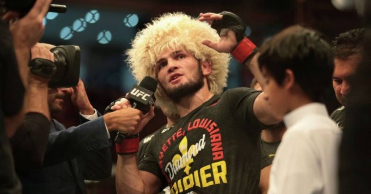 Хабиб Порьені "тұншықтырып", UFC чемпионы атағын қорғады – жекпе-жектің видеосы