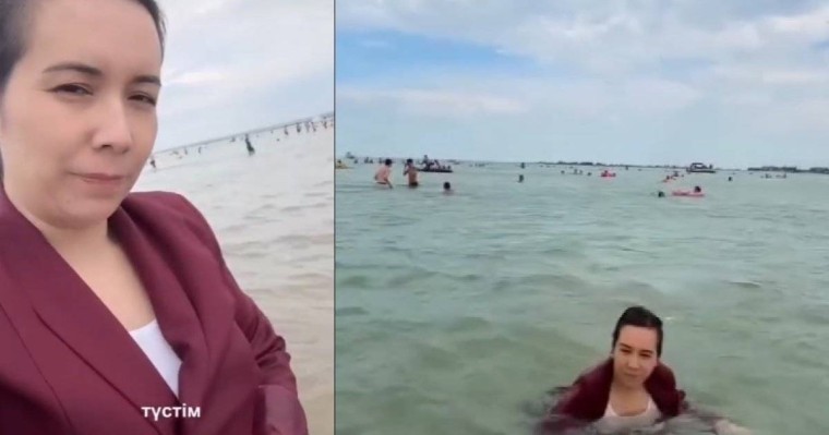 Мұғалім киіммен суға түсті