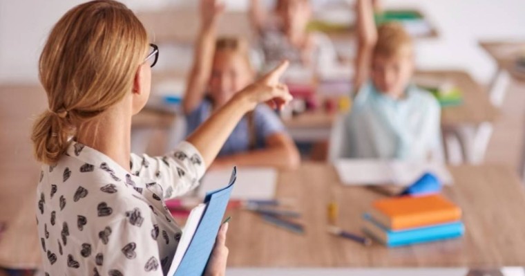 Қандай санаттағы мұғалімдер ұлттық біліктілік тестілеуінен босатылды??