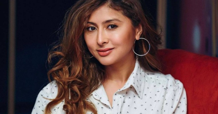 «Қажет болса, неге шешінбеске»: Айнұр Ілиясова сүйісу сахналары бар киноға түсуге дайын екенін айтты