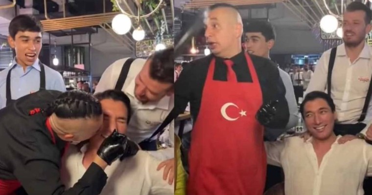 Әлішер Кәрімовті бір топ жігіт сүйіп, денесін уқалаған видеосы тарады