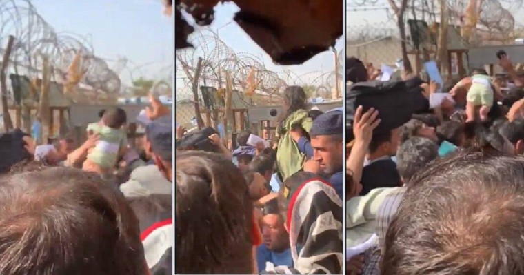 Ауғандық ана сәбиін құтқару үшін тікенек сым арқылы сыртқа қарай лақтырып жіберді (видео)