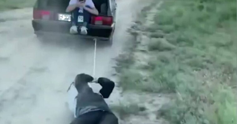 Түркістандық адамды көлікке байлап алып сүйреген (видео)