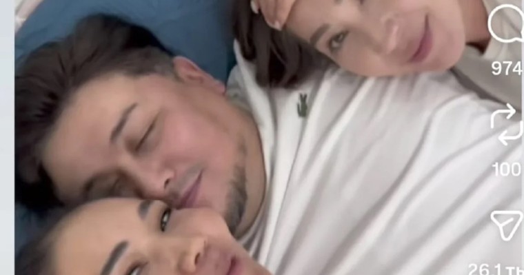 «Арсыздық»: Бәйбішесі мен тоқалының ортасында жатқан ер адамның видеосы көптің ашуын туғызды