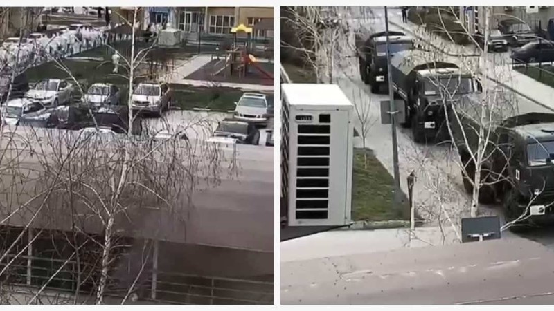 Қорғаныс киімін киген әскерилер: Алматыдағы карантинге жабылған көпқабатты үйдің қоршауға алынуы видеоға түсіп қалды