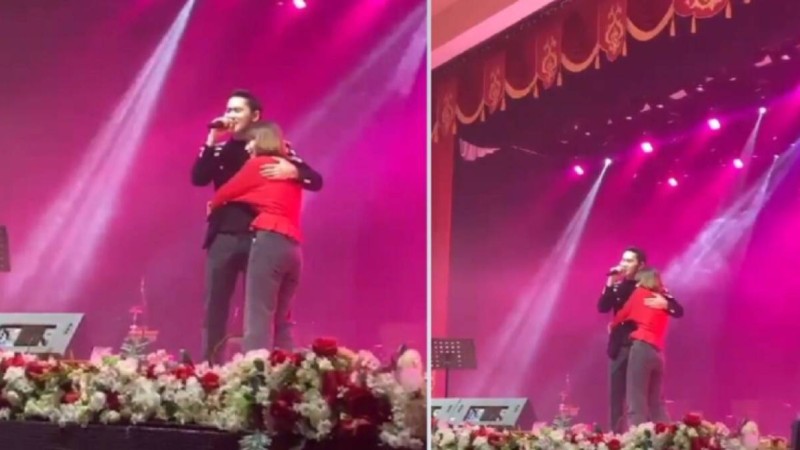 Бойжеткен сахнада ән айтып тұрған Қуандық Рахымды құшақтап жібермей қойды (видео)